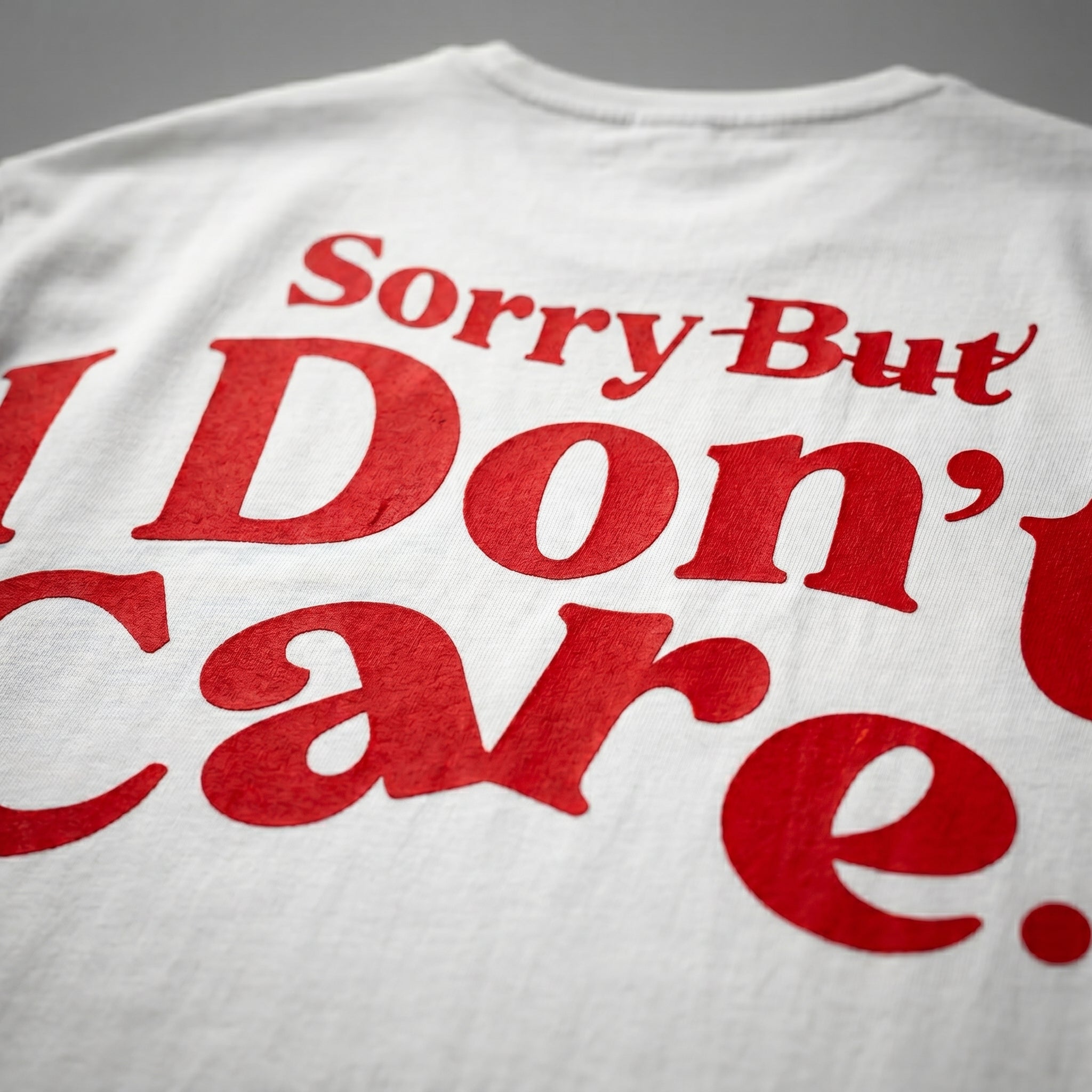 SORRY I DON'T CARE UNISEX OVERSIZED T-SHIRT